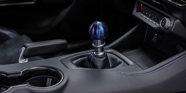 Dark Horse's with the six-speed manual transmission will have a blue titanium shifter ball.