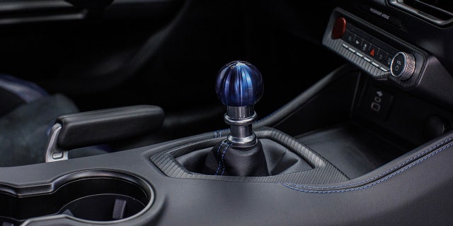 Dark Horse's with the six-speed manual transmission will have a blue titanium shifter ball.