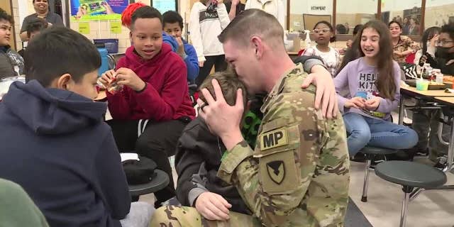 Son sobs into military father's arms during surprise visit from two-year deployment Army Staff Sgt. Brandon Cole, who returned home after being stationed in Germany for two years, surprised his two children at their schools in Henrico County, Virginia. Source: CBS 6 News team