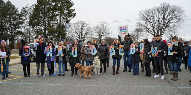 Guests took to the streets of New Hyde Park, New York, for the "Drive out Santos" march.