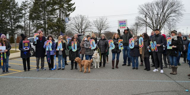 Guests took to the streets of New Hyde Park, New York, for the "Drive out Santos" march.