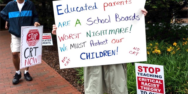 Parents protest the presence of critical race theory in public school curriculums. 