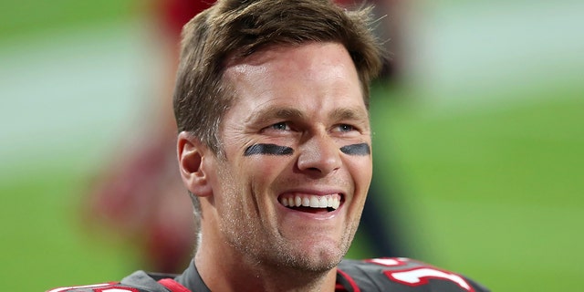 Tom Brady, #12, of the Buccaneers, smiles before the regular season game between the Los Angeles Rams and Tampa Bay Buccaneers on November 23, 2020 at Raymond James Stadium in Tampa, Florida.