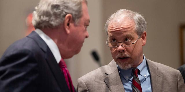 Prosecutor Creighton Waters and defense attorney Dick Harpootlian speak after the jury is excused in Alex Murdaugh’s double murder trial at the Colleton County Courthouse Thursday, Feb. 2, 2023. 