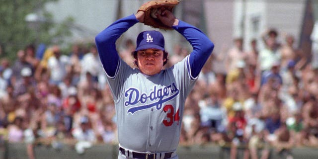 Fernando Valenzuela of the Los Angeles Dodgers pitches during a game at Wrigley Field in Chicago.