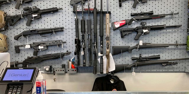 Firearms are displayed at a gun shop in Salem, Oregon, on Feb. 19, 2021.