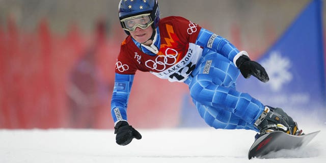 Rosey Fletcher of the U.S. competes in the women's parallel giant slalom snowboard qualifying at Park City Mountain Resort during the Salt Lake City Winter Olympic Games in Utah.