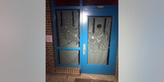 The suspects smashed windows to the main school building while trying to get inside, police said.