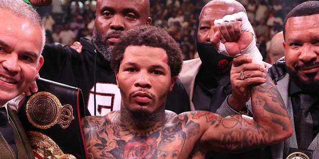 Gervonta Davis poses with the belt after knocking out Rolando Romero with a left hook in the sixth round during their fight for Davis' WBA world lightweight title at Barclays Center May 28, 2022, in Brooklyn, New York. 