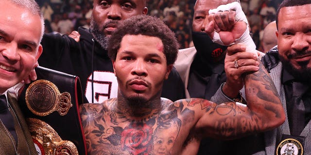 Gervonta Davis poses with the belt after knocking out Rolando Romero with a left hook in the sixth round during their fight for Davis' WBA world lightweight title at Barclays Center May 28, 2022, in Brooklyn, New York.