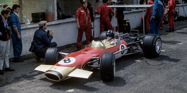 Graham Hill won the 1968 F1 championship driving a Lotus-Ford.