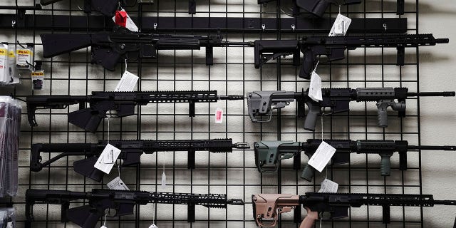 AR-15 style rifles are displayed for sale at Firearms Unknown, a gun store in Oceanside, California, U.S., April 12, 2021