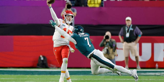 Haason Reddick (7) of the Philadelphia Eagles pressures Patrick Mahomes (15) of the Kansas City Chiefs during the second quarter in Super Bowl LVII at State Farm Stadium Feb. 12, 2023, in Glendale, Ariz.