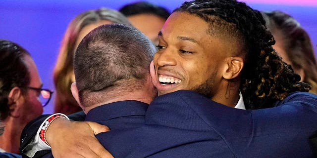 Damar Hamlin of the Buffalo Bills speaks in front of staff at the University of Cincinnati Medical Center during the NFL Honors awards ceremony prior to a Super Bowl 57 football game, Thursday, Feb. 9, 2023, in Phoenix.