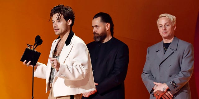 Harry Styles accepts the Grammy for album of the year for "Harry's House."