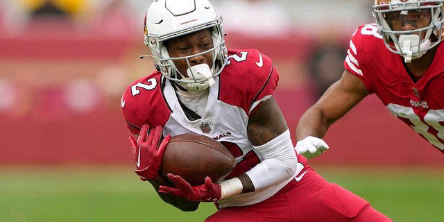Marquise Brown of the Arizona Cardinals catches a pass in front of Deommodore Lenoir of the San Francisco 49ers during the first quarter of a game at Levi's Stadium Jan. 8, 2023, in Santa Clara, Calif. 