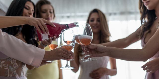 An anonymous 22-year-old bride-to-be (not pictured) said she plans to exclude a friend from her wedding because she won't be old enough to legally drink, according to a recent Reddit post.
