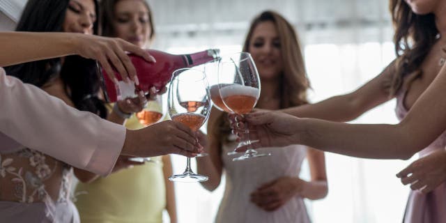 An anonymous 22-year-old bride-to-be (not pictured) said she plans to exclude a friend from her wedding because she won't be old enough to legally drink, according to a recent Reddit post.