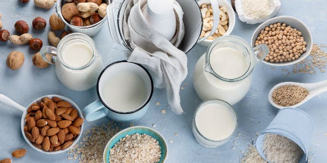 Various bottles of plant-based milk