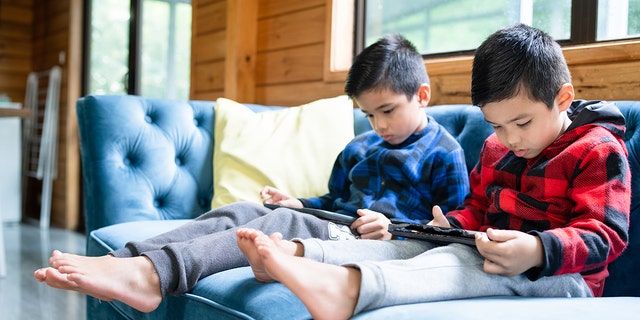 For children ages two to five, AACAP recommends limiting screen time to one hour on a weekday and three hours on weekends for non-educational screen time.