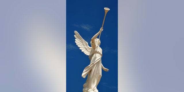 In Dili, East Timor, the Archangel Gabriel is shown blowing a trumpet outside the Roman Catholic Immaculate Conception Cathedral. 
