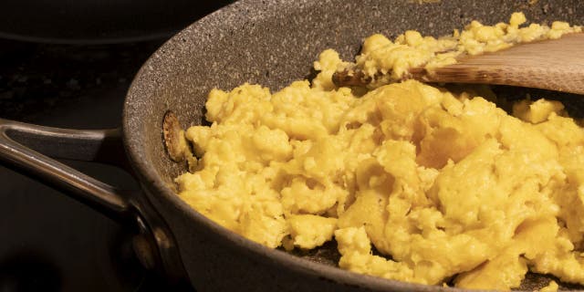 Plant-based eggs can resemble scrambled chicken eggs when cooked in a stovetop pan.