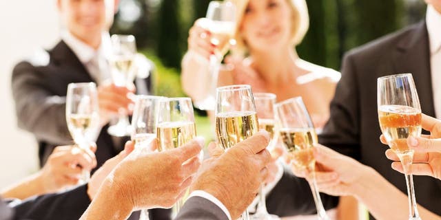 An anonymous bride-to-be (not pictured) has asked Reddit users if she's wrong to exclude guests who aren't 21 from her wedding over legal drinking concerns, and she has attempted to defend her decision in the comment section.