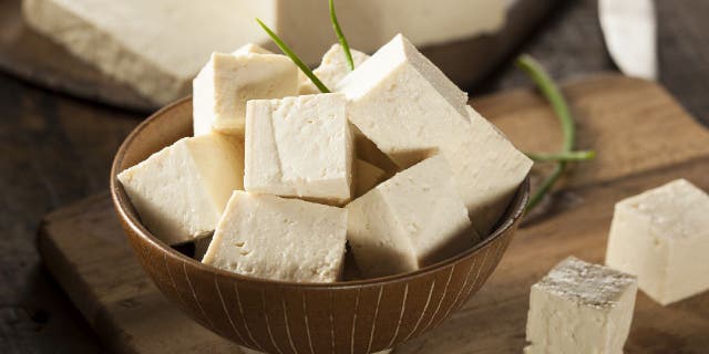 Tofu is a bean curd made from soy milk.