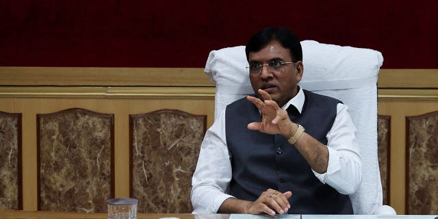 India's Chemicals and Fertilizers Minister Mansukh Mandaviya gestures during his interview at his office in New Delhi on July 15, 2022.