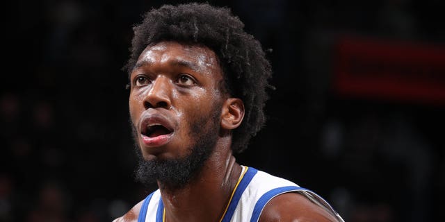 James Wiseman of the Golden State Warriors shoots a free throw during the game against the Brooklyn Nets Dec. 21, 2022, at Barclays Center in Brooklyn, N.Y.