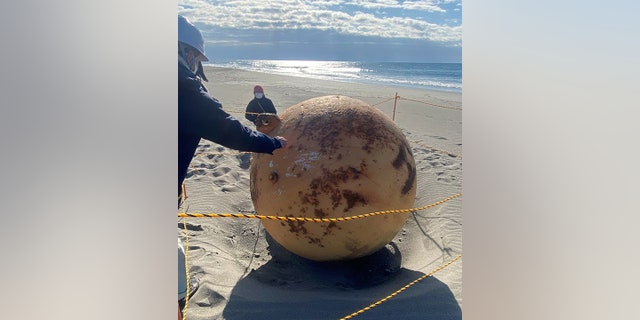 A local jogger called the police after discovering a mysterious metal object on a beach in Hamamatsu, a coastal city about 150 miles from Tokyo.