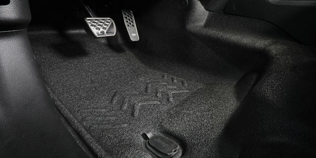 The Jeep Performance Parts heavy-duty flooring system is waterproof and offers sound and temperature insulation.