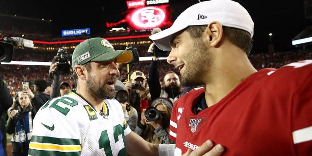 Aaron Rodgers, #12 of the Green Bay Packers, shakes hands with Jimmy Garoppolo, #10 of the San Francisco 49ers, after their game at Levi's Stadium on November 24, 2019, in Santa Clara, California.