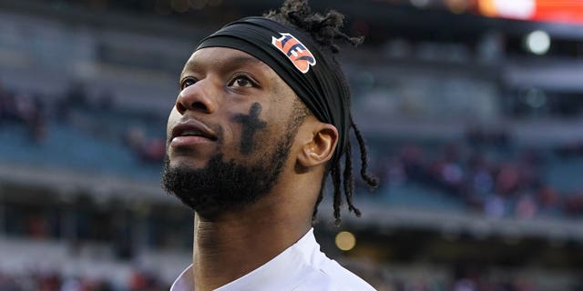 Joe Mixon #28 of the Cincinnati Bengals walks off the field after defeating the Baltimore Ravens 27-16 at Paycor Stadium.