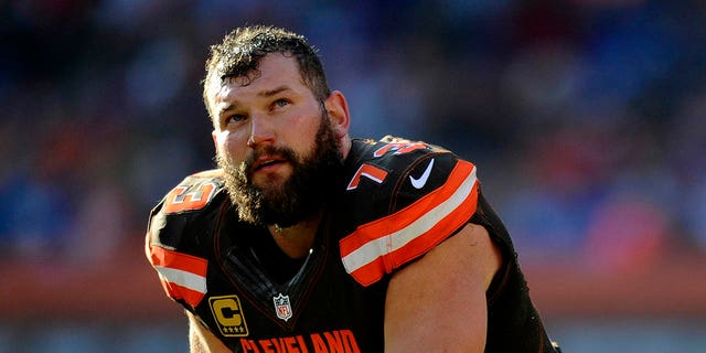 Left tackle Joe Thomas #73 of the Cleveland Browns kneels during timeout in the second quarter of a game against the New York Giants on November 27, 2016 at FirstEnergy Stadium in Cleveland, Ohio. New York won 27-13.
