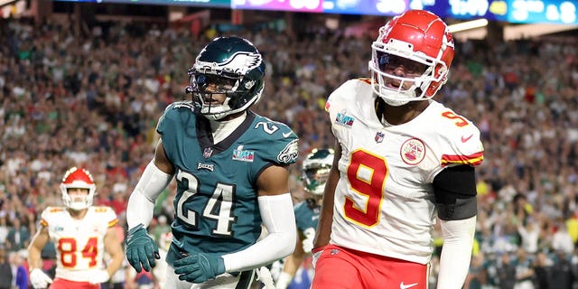 James Bradberry #24 of the Philadelphia Eagles is called for holding against JuJu Smith-Schuster #9 of the Kansas City Chiefs during the fourth quarter in Super Bowl LVII at State Farm Stadium on February 12, 2023 in Glendale, Arizona. 