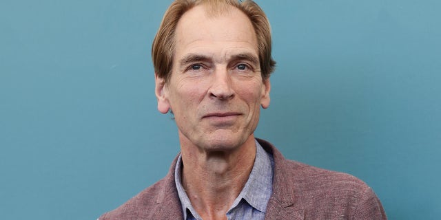 Julian Sands on red carpet in Italy