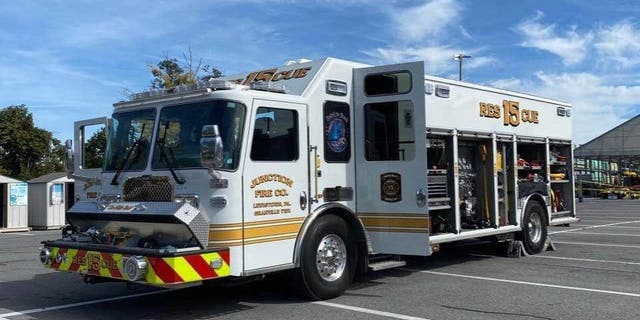 A Junction Fire Company engine is seen in the parking lot of a business.