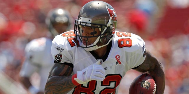 Kellen Winslow, #82 of the Tampa Bay Buccaneers, rushes after a catch during the season opener against the Detroit Lions at Raymond James Stadium on September 11, 2011, in Tampa, Florida. 