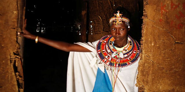 Christine Sitiyan, a woman from the Samburu tribe who escaped from gender-based violence, stands inside the Umoja village where men are restricted on Feb. 7, 2023.