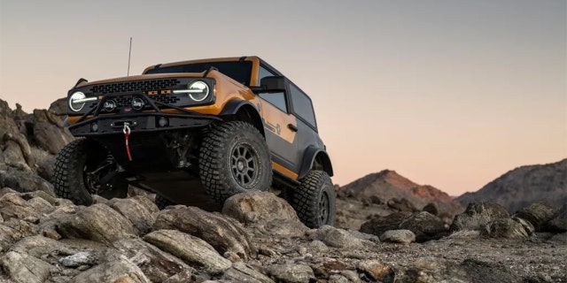 The truck rides on high performance Fox shocks and is lifted four inches.