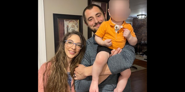 Alexandria and Tyler Borys with their young son.