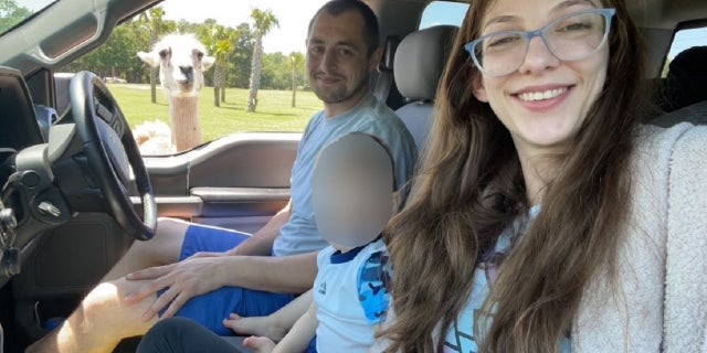 Alexandria and Tyler Borys with their young son.