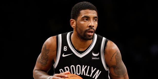 Kyrie Irving #11 of the Brooklyn Nets dribbles during the second half against the Los Angeles Lakers at Barclays Center on January 30, 2023 in the Brooklyn borough of New York City.  The Nets won 121-104.