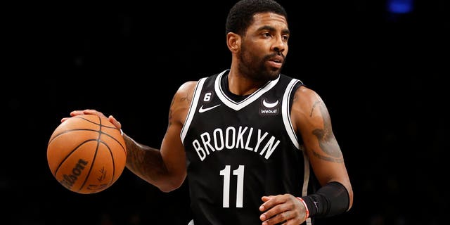 Kyrie Irving of the Brooklyn Nets dribbles during the second half against the Los Angeles Lakers at Barclays Center Jan. 30, 2023, in the Brooklyn borough of New York City.