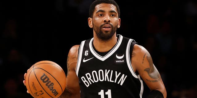 Kyrie Irving of the Brooklyn Nets dribbles against the Los Angeles Lakers at Barclays Center on Jan. 30, 2023 in New York City.