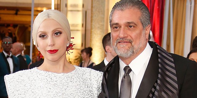 HOLLYWOOD, CA - FEBRUARY 22: Recording artist Lady Gaga (L) and Joseph Germanotta arrive at the 87th Annual Academy Awards at Hollywood & Highland Center on February 22, 2015 in Los Angeles, California. (Photo by Jeff Vespa/WireImage)