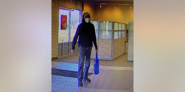 Farrar allegedly entered the bank wearing a hoodie and face mask before stealing an undisclosed amount of money.