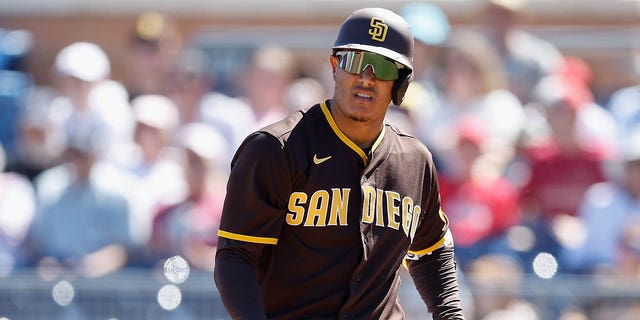 Manny Machado of the San Diego Padres bats against the Los Angeles Angels during an MLB spring training game at Peoria Stadium March 23, 2022, in Peoria, Ariz. 