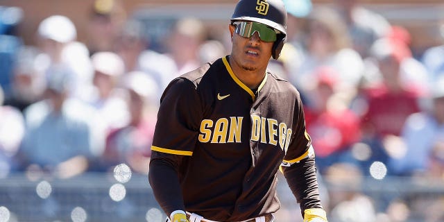 Manny Machado of the San Diego Padres bats against the Los Angeles Angels during a spring training game at Peoria Stadium in Peoria, Arizona, on March 23, 2022.